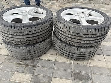 disk niva: 5 saplı yüngül lehimli disk və şin komplekti - Ölçü: 17" - Bolt — 2