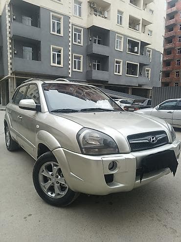 guzgusu: Hyundai Tucson (1-ci nəsil) krossover/SUV - Korpus rəngi: açıq gümüş — 2