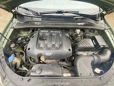 Kia: Kia Sportage: 2 л | 2007 г. Кроссовер — 7