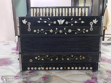 Qarmon, Akustik, İşlənmiş, Ünvandan götürmə