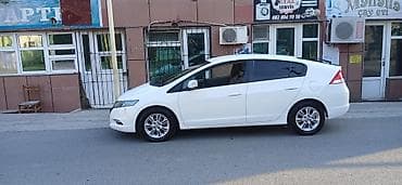 ag neft: Honda Insight: 1.3 l | 2011 il Hetçbek — 7