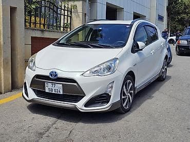 kia optima r18: Toyota Aqua Hybrid, ağ rəng, hetçbek gövdə. Əsas xüsusiyyətlər: - — 1