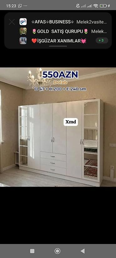 Ağ rəngli, çoxfunksiyalı paltar dolabı. Ölçülər: D 47 × H 200 × E 240