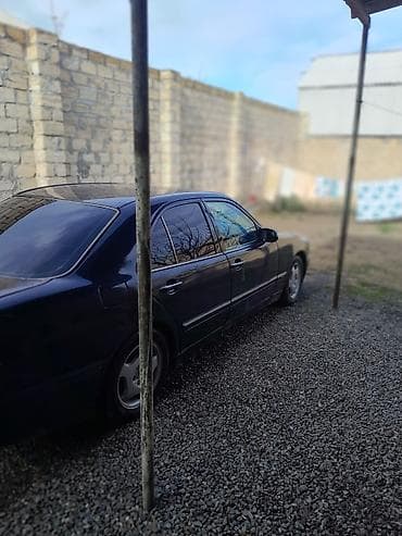 bmw e39 spoiler: Mercedes-Benz E 220: 2.2 l | 2000 il Sedan — 2