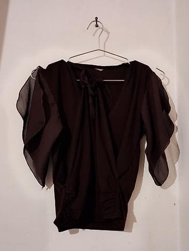 Kişi geyimləri: Qadın bluzası – qəhvəyi rəng
8manat — 1