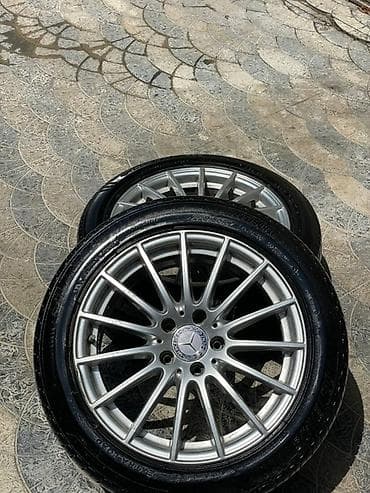 kalpak disk: Mercedes üçün 225/50R17 ölçülü təkərlər disklərlə birlikdə. Disklər — 2