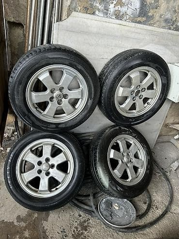 teker 16 type 1: 195/65 R15 tipli ölçü Paket: - 4 ədəd disk + üzərində şinlər — 1