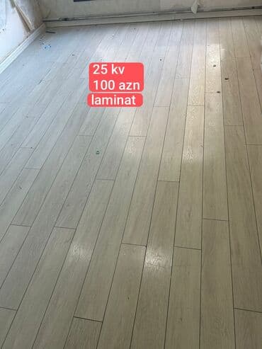 булочки оптом: Laminal döşəmə – açıq boz/ağac teksturalı, uzun panel dizaynı. - — 1