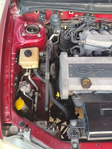 kia forte 2017: Kia Sephia: 1.6 l | 1998 il Sedan — 10