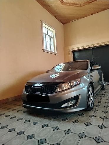 opdima: Kia Optima: 2 l | 2011 il Sedan — 7