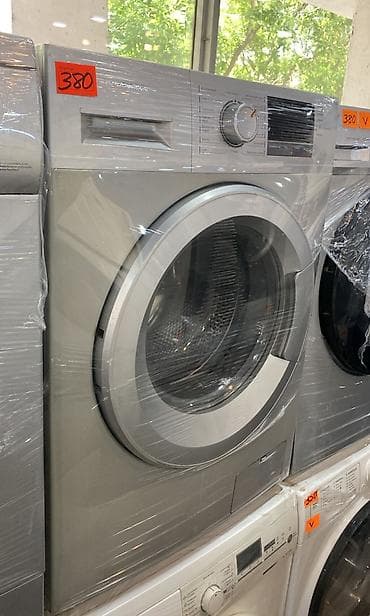 kantak kom: Gümüş rəngli önyükləməli paltaryuyan maşın Xüsusiyyətlər: - Ön — 1