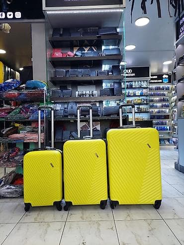 Parlaq sarı rəngdə 3-lü sərt korpuslu səyahət çamadan dəsti -