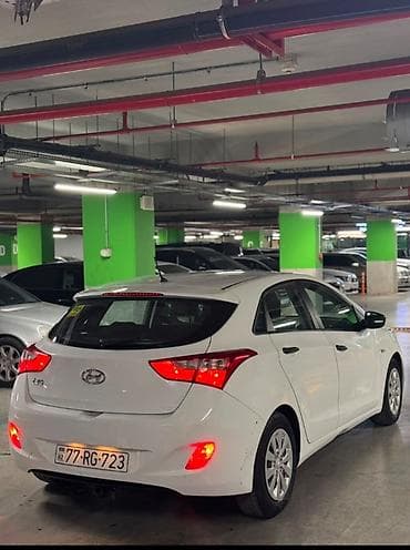 Транспорт: Hyundai i30: 1.4 л | 2015 г. Хэтчбэк — 5