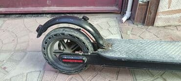 elektrik samokatlar: Elektrik skuter - Qara rəngdə, şəhər üçün komfortlu dizayn - Ön və — 3