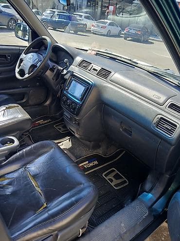 baqaj: Honda CR‑V (1-ci nəsil) – yaşıl rəngli, 5 qapılı, şəhər və yüngül — 2