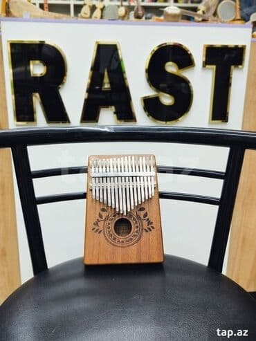 dominos sumqayit: Kalimba ağac materialından hazırlanıb Model; Stewen Rast musiqi — 1