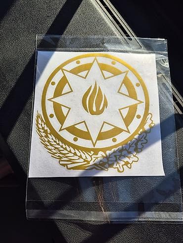kvad: Qızılı rəngdə Azərbaycanın gerbi naxışlı vinil stiker - Material — 1