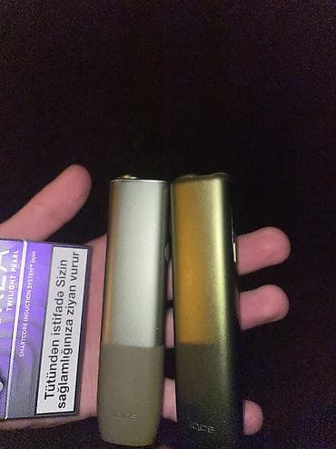 Məhsul: IQOS ILUMA cihazları və TEREA Twilight Pearl stikləri Təsvir — 2