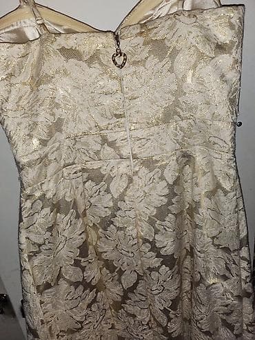 Baş geyimləri: Bir defe geyinilib,xs/s razmer - Material: parıltılı jacquard — 2