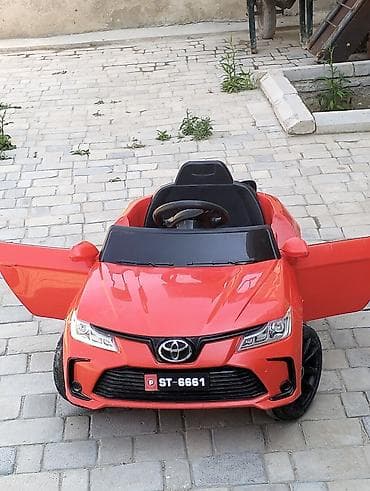 Uşaq elektrikli maşın – qırmızı rəng, açılan iki qapı, sport dizayn