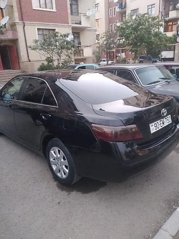 vaz2107 satisi: Toyota Camry – sedan Xüsusiyyətlər: - Kuzov: qara rəng, 4 qapı, sedan — 2