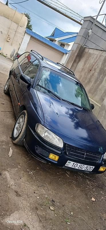 Opel: Opel Astra F Caravan (universal), tünd mavi rəng. - Kuzov: universal — 1
