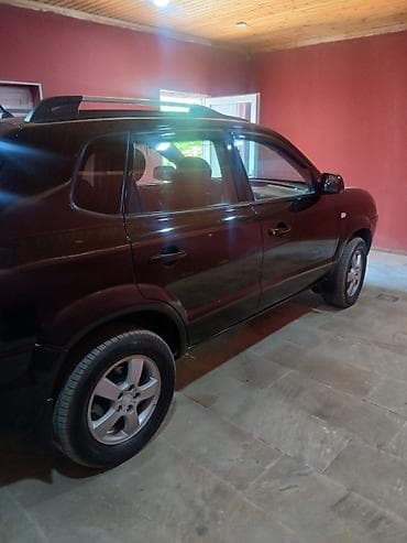 teker traktor: Hyundai Tucson: 2 l | 2007 il Krossover — 6