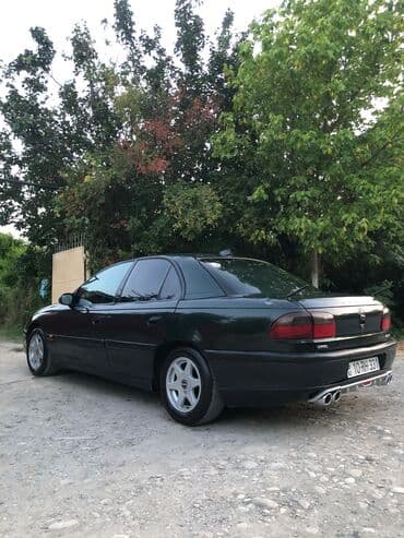 опел зафира б: Opel Omega: 2.5 л | Седан — 8