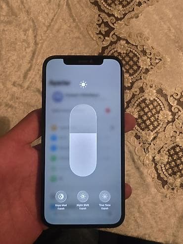 3 simli telefon: IPhone 12 Pro, Pacific Blue, Face ID — 3