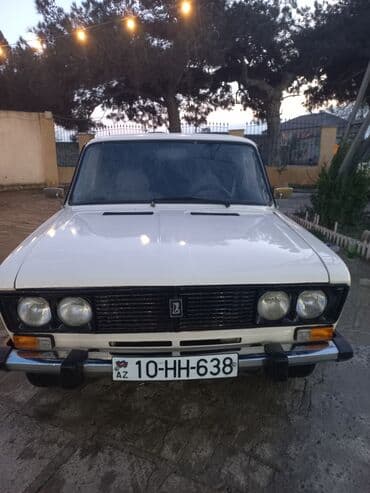 kia sportage benzin: VAZ 2106, ağ rəng, 4 qapılı sedan. - Klassik xarici görünüş: xrom ön — 6