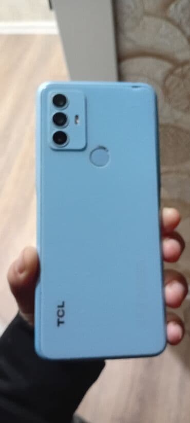 xarab kamera: TCL smartfon - Rəng: Açıq mavi - Arxa paneldə barmaq izi skaneri - — 2