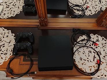 Playstation 4 Slim 1 TB içində 6 oyun var praşipkalı modeldi 4 aydı