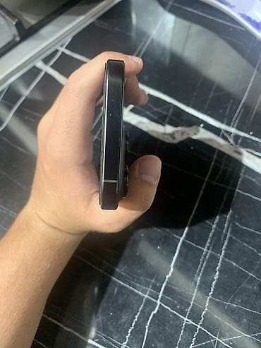 telefon iphone 7: IPhone 16 Pro, 128 GB, Black Titanium, Simsiz şarj, Face ID — 7