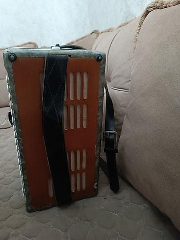 Qarmon, Akustik, İşlənmiş