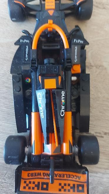 model 220333qag: LEGO tərzində yığma F1 bolidi modelidir. Narıncı-qara rəng sxemi və — 3