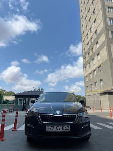 ucuz aftamabil: Skoda Rapid, qara rəng, sedan gövdə. Texniki və komfort — 5