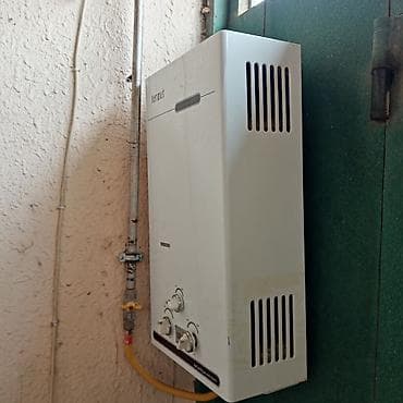 Dekorativ divar panelləri: Ter-met qazla işləyən axın tipli su qızdırıcısı - Marka/model: Termet — 2