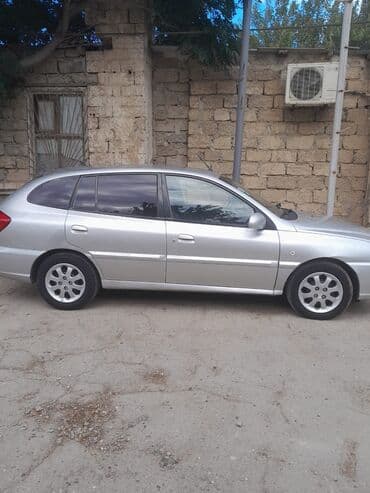 kia cerato 2012: Kia Rio 2004 (sedan, gümüş rəng). Avtomobil tam komplekt kimi və ya — 2