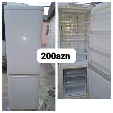 İki kameralı soyuducu (aşağıda dondurucu, yuxarıda əsas bölmə). Ağ