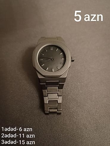 saat ucuz: Minimalist dizayna malik analoq qol saatı. - Rəng: tünd boz/qara - — 1
