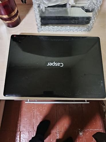 Masaüstü kompüterlər və iş stansiyaları: Casper noutbuk - Korpus: qara, parlaq üst qapaq. Alt hissədə — 1