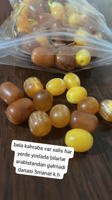 clindoxyl jel qiymeti: Məhsul: Kəhrəba muncuqlar Təsvir: - Rənglər: sarı, qəhvəyi və bal — 1