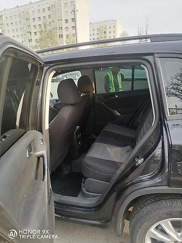 mercedes e 2: Volkswagen Tiguan: 2 l | 2009 il Ofrouder/SUV — 6