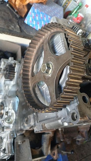 mini moto: Mühərrik üçün dişli kasnak və ön yağ nasosu/qapaq hissəsi ilə bağlı — 1