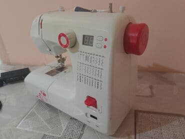 Elektron tikiş maşını - Kompakt, stolüstü model; ağ korpus, qırmızı