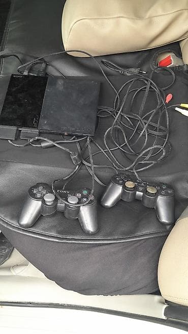 PS4 (Sony PlayStation 4): Sony PlayStation 2 Slim oyun konsolu seti Komplekt: - PS2 Slim — 1