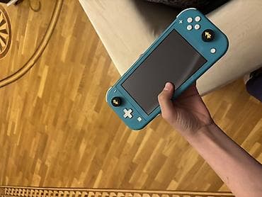 Nintendo Switch Lite – türkuaz rəngdə portativ oyun konsolu