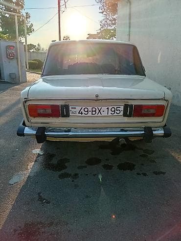 Nəqliyyat: VAZ 2106 sedan - Korpus: 4 qapılı, bej/ağ rəng, xrom bamperlər — 2