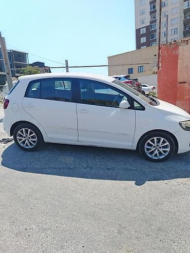 velosiped diski: Volkswagen Golf Plus, ağ rəng, 5 qapılı hatchback/minivan tərzi kuzov — 2