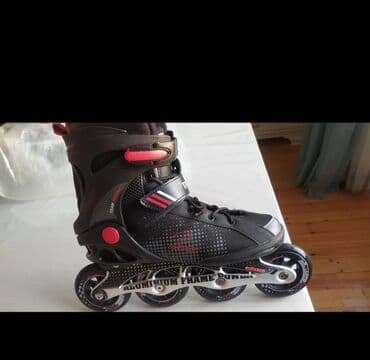 Trenajorlar: Dörd təkərli qara rəngli inline konkisi. Alüminium çərçivəyə malikdir — 3